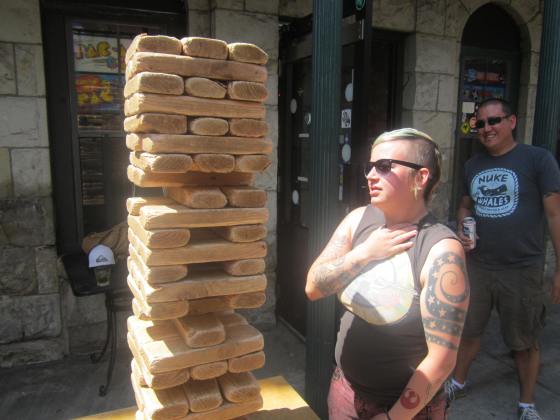 Rebecca contemplating her next move; Jon is clearly amused